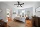 Main bedroom with ceiling fan and hardwood floors at 66 Howell Ne St, Atlanta, GA 30312