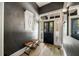 Elegant entryway featuring high ceilings, light hardwood floors, and a decorative mirror at 66 Howell Ne St, Atlanta, GA 30312