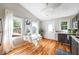 Bright kitchen with vaulted ceilings, hardwood floors, and an eat-in dining area at 66 Howell Ne St, Atlanta, GA 30312