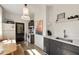 Modern kitchen featuring dark gray cabinets, white countertops, and a breakfast nook at 66 Howell Ne St, Atlanta, GA 30312