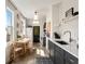 Modern kitchen with stainless steel appliances, lots of sunlight, and an adjacent eating area at 66 Howell Ne St, Atlanta, GA 30312