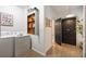 Well-organized laundry room with shelving and convenient access to other areas of the home at 66 Howell Ne St, Atlanta, GA 30312