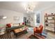 Stylish living room featuring modern furniture, a unique rug, and ample natural light at 66 Howell Ne St, Atlanta, GA 30312