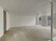 Large finished basement area with neutral carpeting and natural light at 170 Eldorado Dr, Carrollton, GA 30116