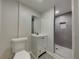 Basement bathroom with a shower and modern vanity at 170 Eldorado Dr, Carrollton, GA 30116