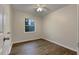 Bright bedroom with hardwood floors and ample natural light at 170 Eldorado Dr, Carrollton, GA 30116