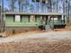 Charming ranch home with updated exterior and landscaping at 170 Eldorado Dr, Carrollton, GA 30116