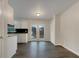 Modern kitchen with white cabinets and French doors at 170 Eldorado Dr, Carrollton, GA 30116
