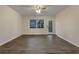 Spacious living room with hardwood floors and large windows at 170 Eldorado Dr, Carrollton, GA 30116