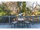 Relax on this inviting back deck featuring an outdoor seating area with serene views at 3448 Montreal Way, Tucker, GA 30084