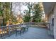 Enjoy outdoor living on this backyard deck featuring a seating area with a green view at 3448 Montreal Way, Tucker, GA 30084