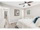 Bedroom with cozy bedding, stylish decor, and a view of the hallway at 3448 Montreal Way, Tucker, GA 30084