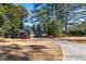 Quaint home with a truck parked on the lawn, exuding curb appeal and a welcoming driveway at 3448 Montreal Way, Tucker, GA 30084