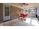 Relax in the screened patio with a ceiling fan and outdoor seating, a perfect retreat at 3448 Montreal Way, Tucker, GA 30084