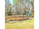 A colorful playset and swings provide recreational activities at the community park at 3448 Montreal Way, Tucker, GA 30084