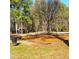 Montreal Park features a playground with swings and play structures in a natural setting at 3448 Montreal Way, Tucker, GA 30084