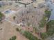 Aerial view showing house and lake access at 3657 Linda Dr, Loganville, GA 30052