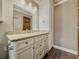 Bathroom with granite countertop and white cabinets at 3657 Linda Dr, Loganville, GA 30052