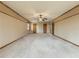 Large bedroom with neutral carpeting and ceiling fan at 3657 Linda Dr, Loganville, GA 30052