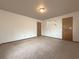 Simple bedroom with built-in shelving and carpet at 3657 Linda Dr, Loganville, GA 30052