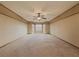 Spacious bedroom with ceiling fan and large window at 3657 Linda Dr, Loganville, GA 30052