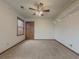 Bedroom with ceiling fan and window with blinds at 3657 Linda Dr, Loganville, GA 30052