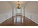 Bright dining room with hardwood floors, wainscoting, and bay window at 3657 Linda Dr, Loganville, GA 30052