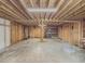 Unfinished garage with shelving and high ceilings at 3657 Linda Dr, Loganville, GA 30052