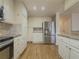 Modern kitchen boasts stainless steel appliances and ample cabinetry at 3657 Linda Dr, Loganville, GA 30052