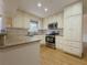 Kitchen with granite countertops and stainless steel appliances at 3657 Linda Dr, Loganville, GA 30052