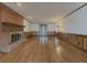 Spacious living room with hardwood floors and brick fireplace at 3657 Linda Dr, Loganville, GA 30052