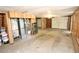 Unfinished basement with garage access and appliances at 3035 Saint Andrews Dr, Duluth, GA 30096