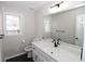 Modern bathroom with white vanity and quartz countertop at 3035 Saint Andrews Dr, Duluth, GA 30096