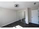 Bedroom with mirrored closet doors and hardwood floors at 3035 Saint Andrews Dr, Duluth, GA 30096