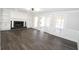 Living room with fireplace and built-in shelving at 3035 Saint Andrews Dr, Duluth, GA 30096