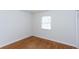 Bright bedroom with hardwood floors, window, and ceiling fan at 3103 Colonial Way # A, Chamblee, GA 30341