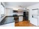 Well-equipped kitchen featuring granite countertops and stainless steel appliances at 3103 Colonial Way # A, Chamblee, GA 30341