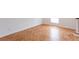 Bright room featuring hardwood floors, neutral walls, and a window at 3103 Colonial Way # A, Chamblee, GA 30341