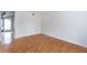 View of an empty room featuring hardwood floors and natural light at 3103 Colonial Way # A, Chamblee, GA 30341