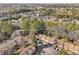 Scenic aerial view of a neighborhood with townhomes surrounded by mature trees and landscaping at 3420 Ashwood Ln # 3420, Atlanta, GA 30341