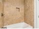 Tiled shower and tub in updated bathroom at 3420 Ashwood Ln # 3420, Atlanta, GA 30341