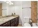 Updated bathroom with granite counters, new cabinets, and tiled shower at 3420 Ashwood Ln # 3420, Atlanta, GA 30341