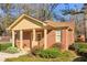 Inviting brick building with well-manicured landscaping and covered entrance at 3420 Ashwood Ln # 3420, Atlanta, GA 30341