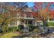 Two-story house with front porch and landscaping at 627 Village Manor Pl, Suwanee, GA 30024