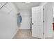 Spacious walk-in closet with built-in shelving and hanging rods at 627 Village Manor Pl, Suwanee, GA 30024