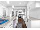 Modern kitchen with white cabinets and granite island at 2147 Cascade Sw Rd, Atlanta, GA 30311