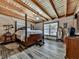 Cozy bedroom with wood-paneled walls and a four-poster bed at 255 Marks Way, Canton, GA 30115