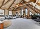 Spacious living room with vaulted wood ceilings, multiple windows, and plush seating at 255 Marks Way, Canton, GA 30115