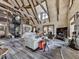 Inviting living room with spiral staircase, stone fireplace, and comfortable seating at 255 Marks Way, Canton, GA 30115
