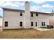 The home features a simple backyard with a patio that is perfect for outdoor activities at 2756 Palmview Sw Ct, Atlanta, GA 30331